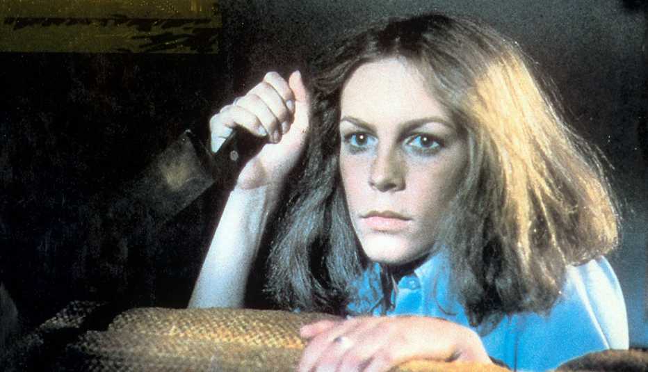 Jamie Lee Curtis holds a knife in a scene from the film Halloween