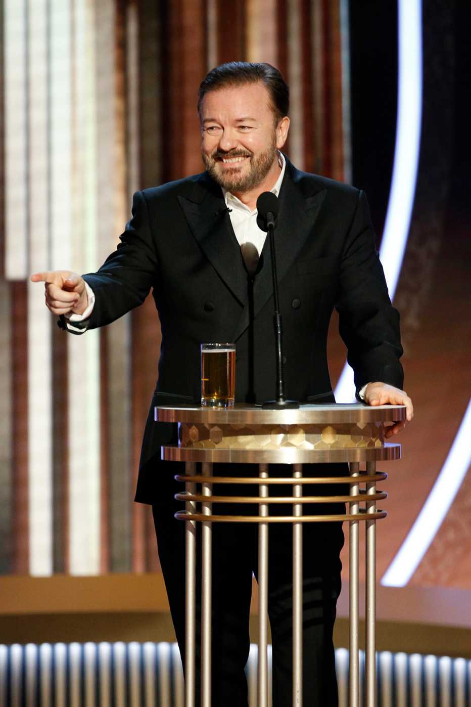 Ricky Gervais onstage hosting the 77th Annual Golden Globe Awards