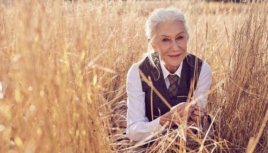Helen Mirren poses in a field in Montana where her new show 1923 is being shot