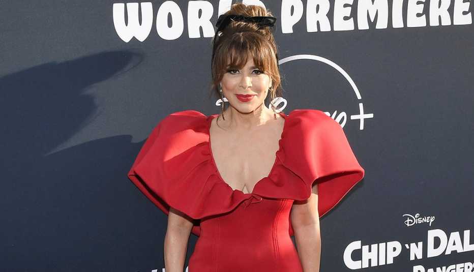 Paula Abdul wearing a red dress on the red carpet at the Chip N Dale Rescue Rangers World Premiere