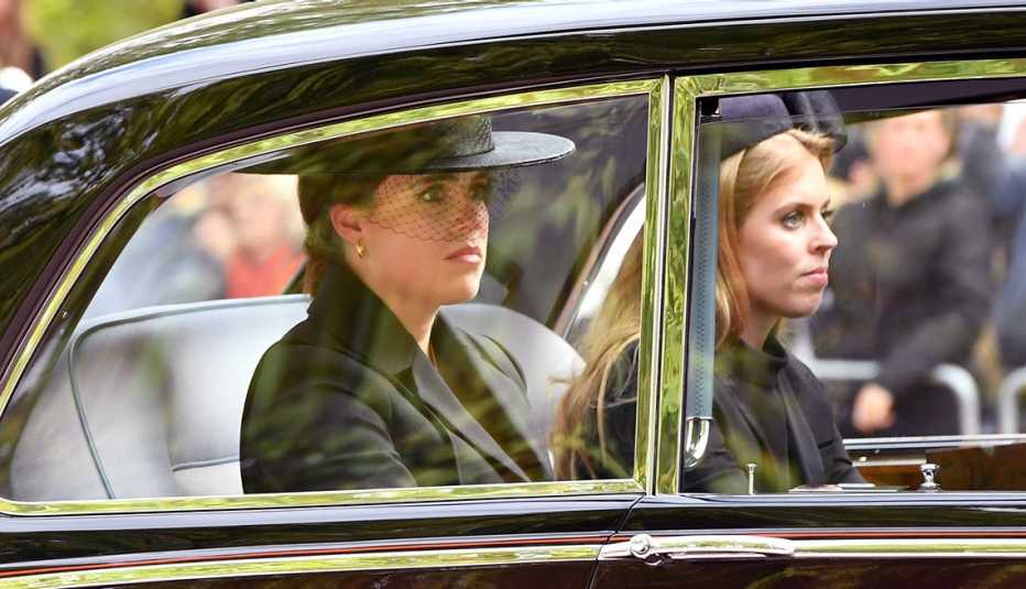 Princess Eugenie and Princess Beatrice depart Westminster Abbey during the State Funeral of Queen Elizabeth II