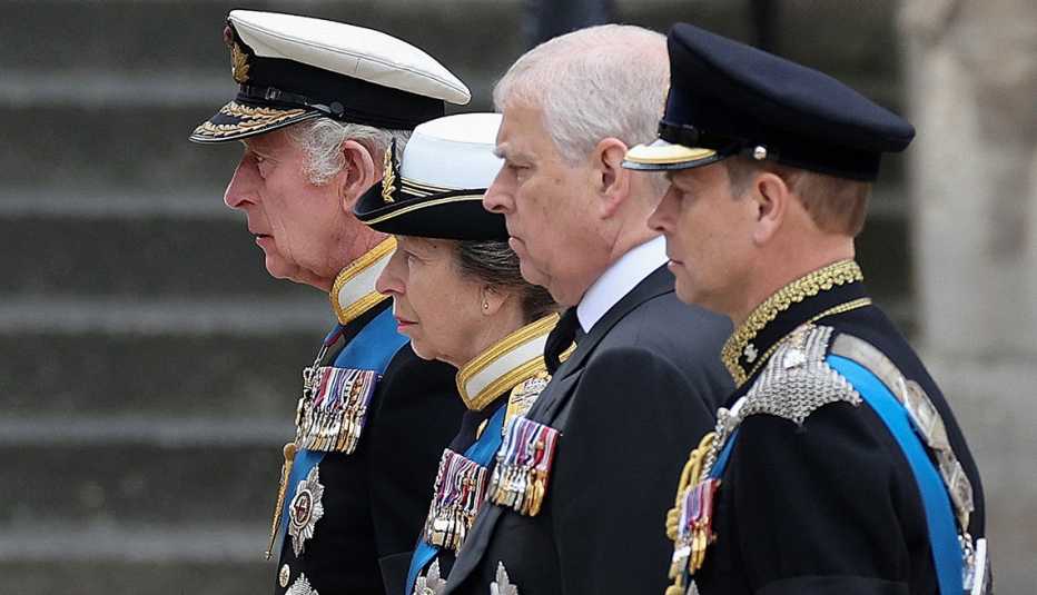 King Charles III, Princess Anne, Prince Andrew, and Prince Edward stand behind the coffin of Queen Elizabeth II