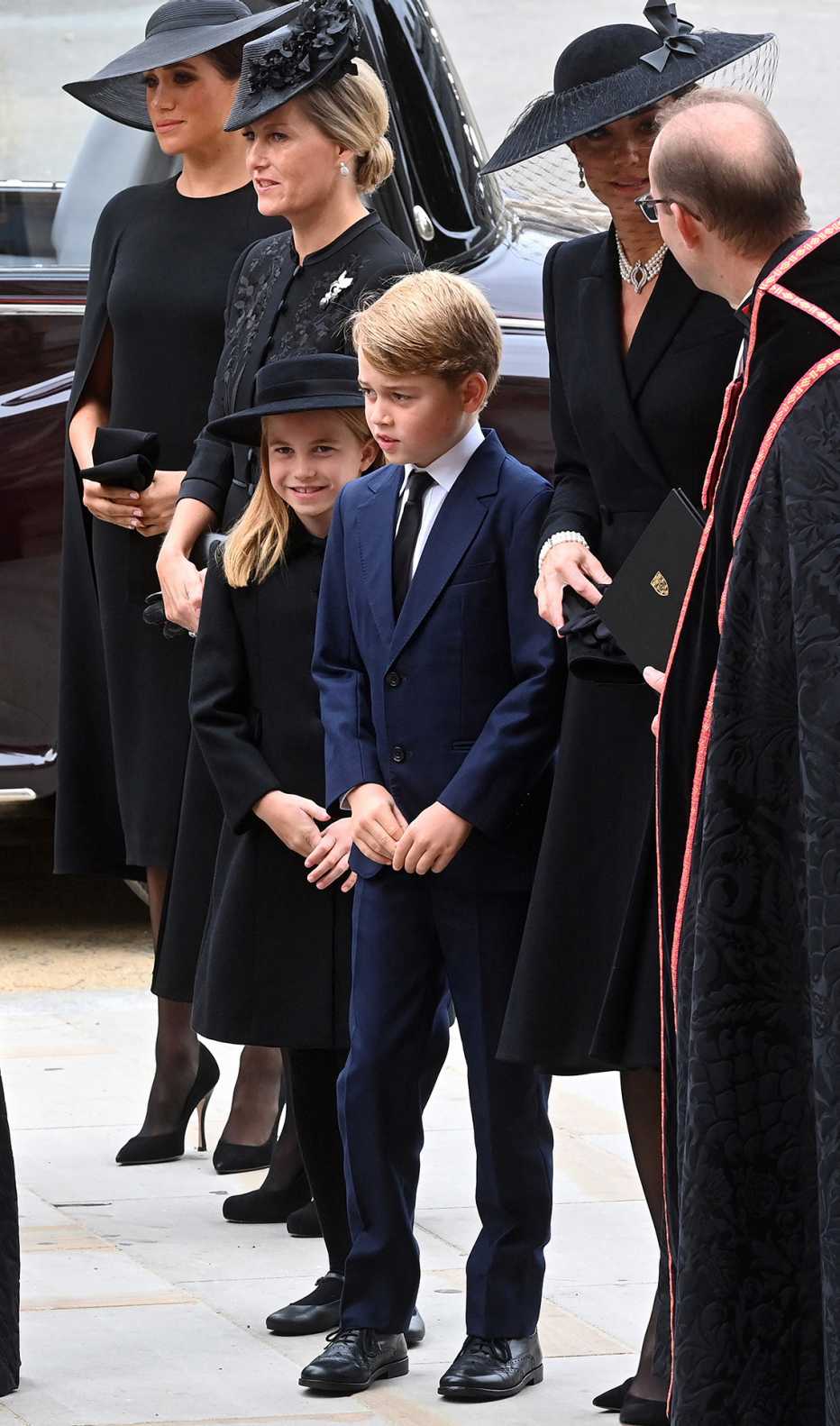 Meghan, Duchess of Sussex, Britain's Sophie, Countess of Wessex, Britain's Princess Charlotte of Wales, Britain's Prince George of Wales and Britain's Catherine, Princess of Wales arrive at Westminster Abbey in London on September 19, 2022, for the State Funeral Service for Britain's Queen Elizabeth II
