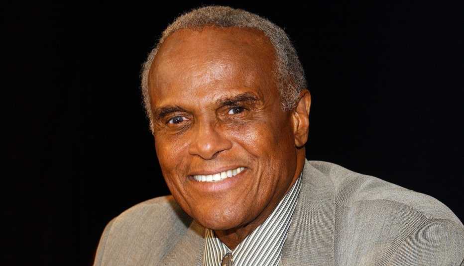 Singer and actor Harry Belafonte smiling for a portrait