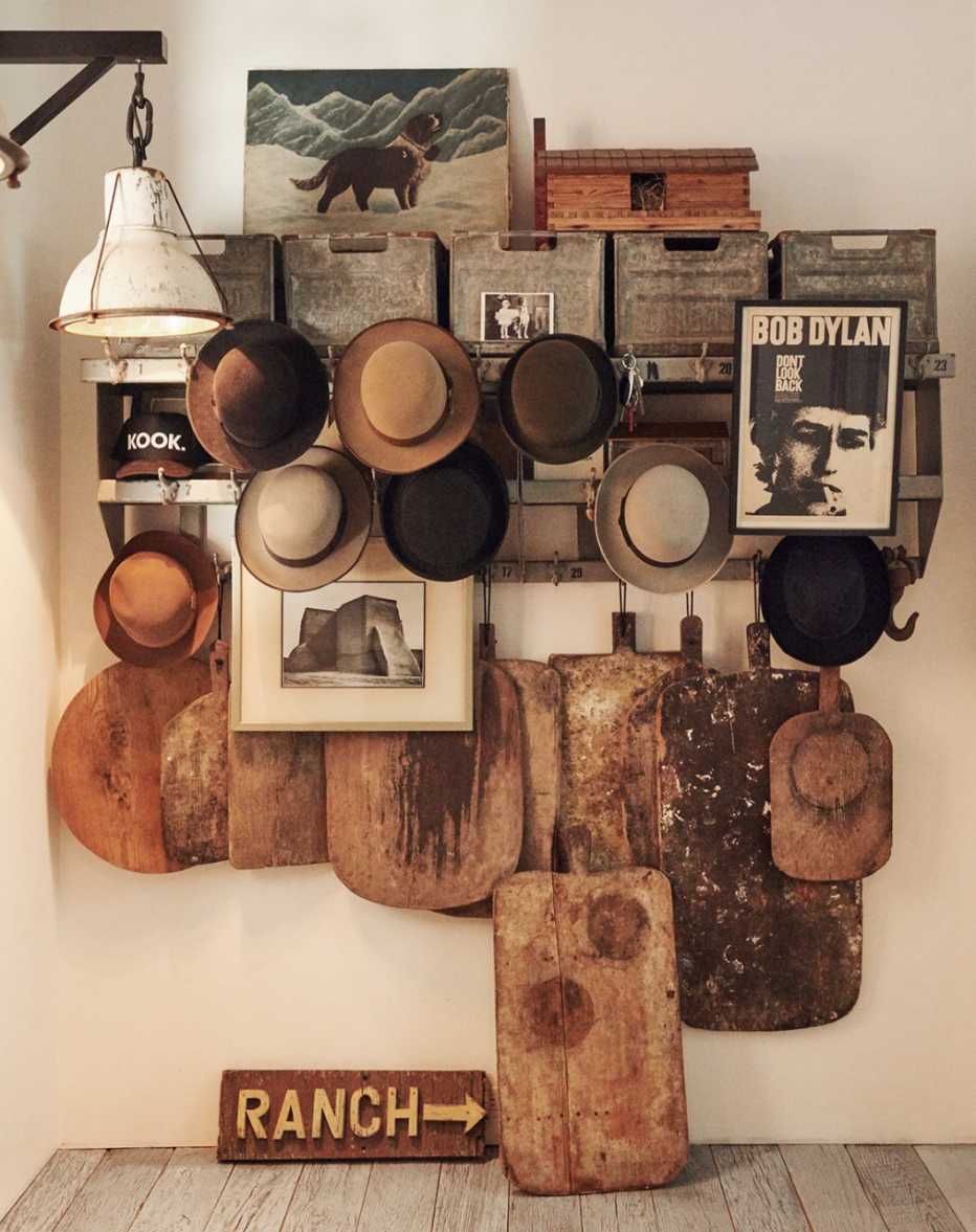 Diane Keaton at home - a kitchen entryway with her hats and cutting boards 