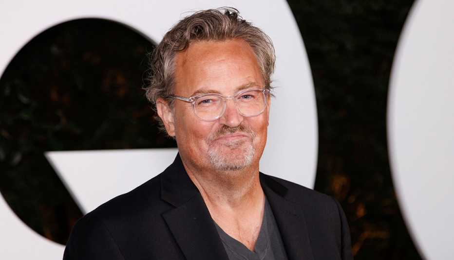 matthew perry wearing glasses and smiling