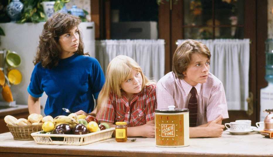 Justine Bateman, Tina Yothers and Michael J. Fox in a scene from the television show "Family Ties."