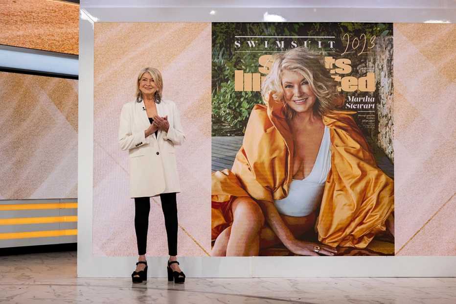 Martha Stewart stands next to a screen showing her cover for the 2023 Sports Illustrated Swimsuit Issue on the Today show