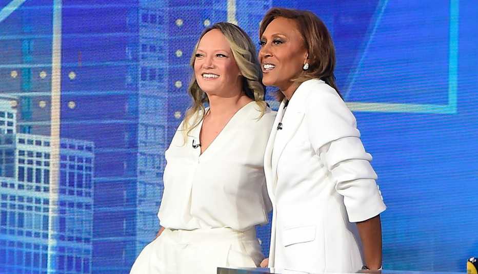  Amber Laign and Robin Roberts smile on the set of "Good Morning America" in August.