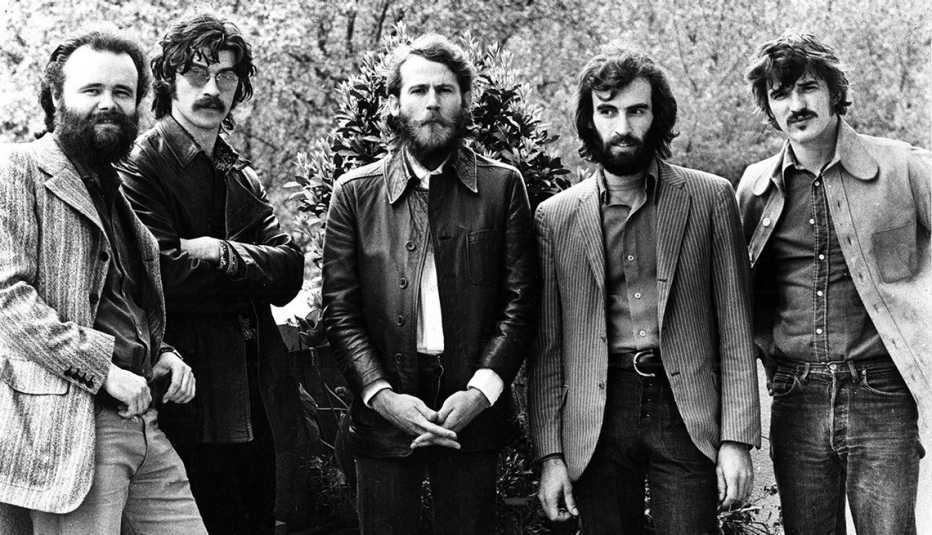 garth hudson robbie robertson levon helm richard manuel and rick danko of the band pose for a group portrait in london