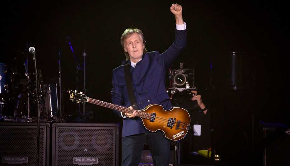 Paul McCartney raises his fist in the air during his performance at MetLife Stadium for his Got Back tour 