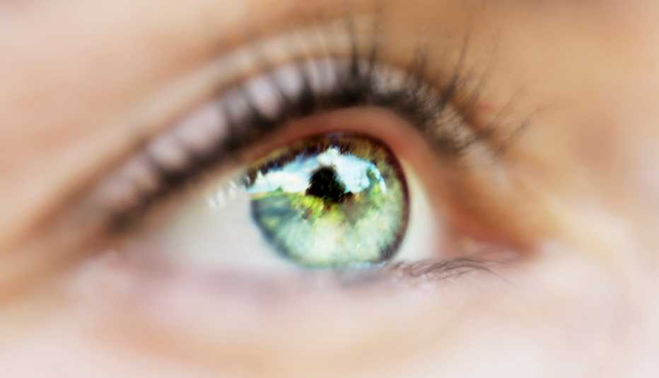 close up of a woman's bright green eye
