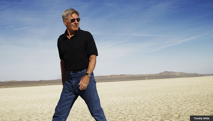 Harrison Ford walking in the desert