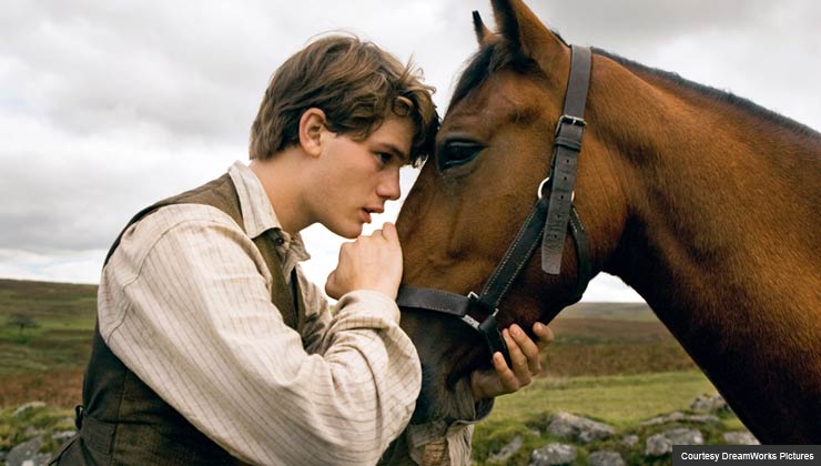 Albert (Jeremy Irvine) and his horse Joey are featured in this scene from DreamWorks Pictures' "War Horse"