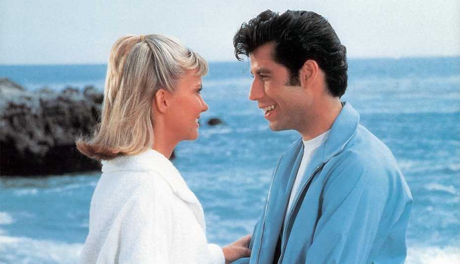 Olivia Newton-John and John Travolta on the beach in a scene from the film 'Grease'