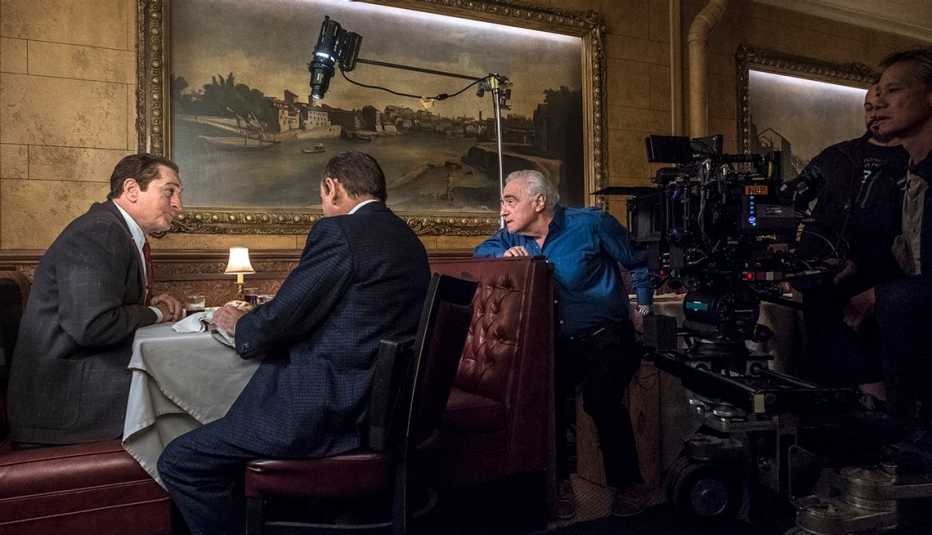 Martin Scorsese directs Robert De Niro and Joe Pesci in a scene from The Irishman