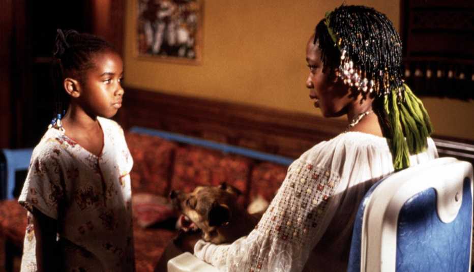 Zelda Harris and Alfre Woodard looking at each other in a scene from the film Crooklyn