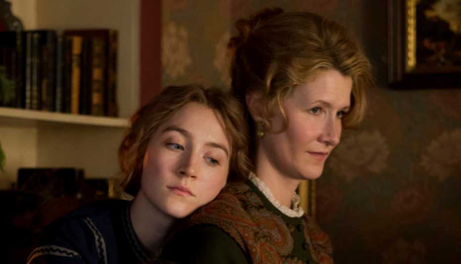 Saoirse Ronan places her head on Laura Dern's shoulder in Little Women