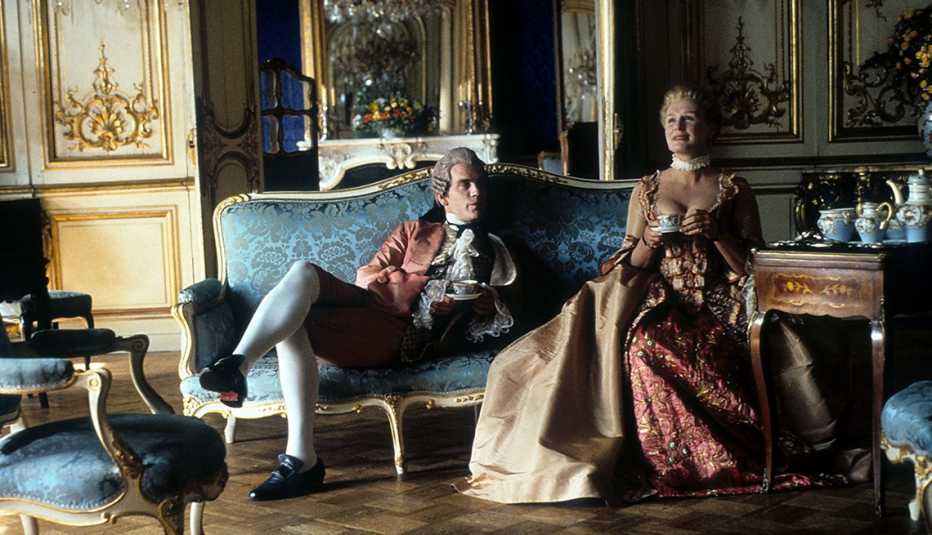 John Malkovich and Glenn Close having tea together in a scene from the film Dangerous Liaisons