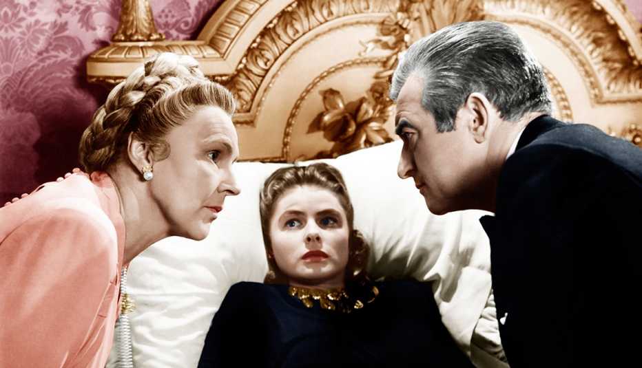 Leopoldine Konstantin, Ingrid Bergman and Claude Rains in a scene from the film Notorious