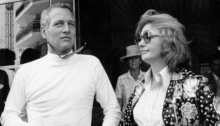 Paul Newman and Joanne Woodward standing together