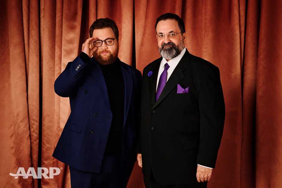 Paul Walter Hauser and Kary Antholis pose for a portrait at the AARP Movies for Grownups Awards