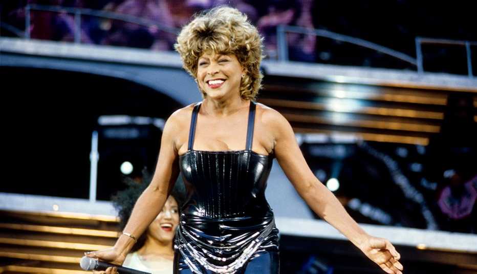 Tina Turner performing onstage at Wembley Stadium in London