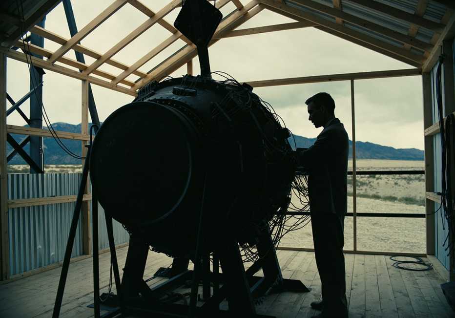 cillian murphy working on a bomb in the film oppenheimer