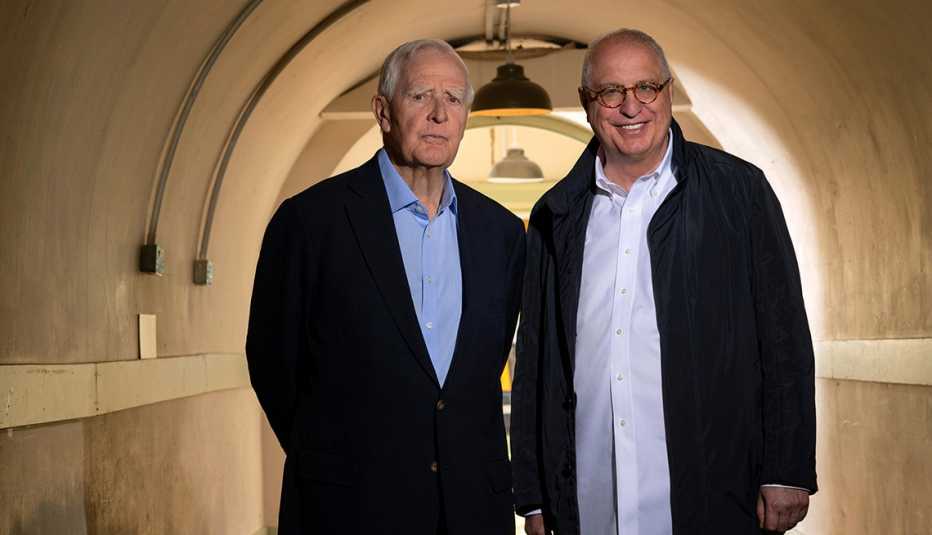author john le carre stands next to errol morris in a tunnel