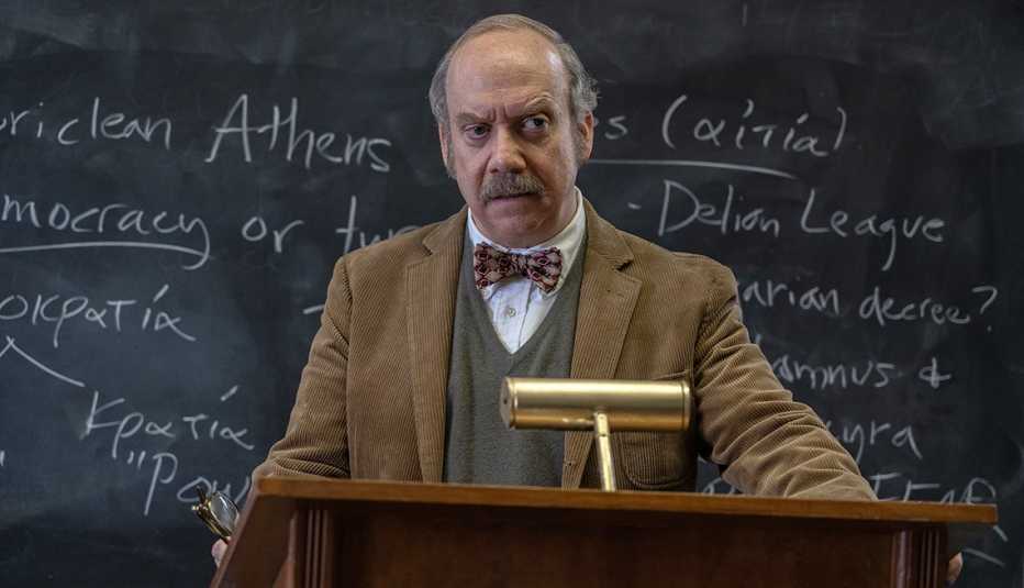 paul giamatti at a podium teaching in the holdovers