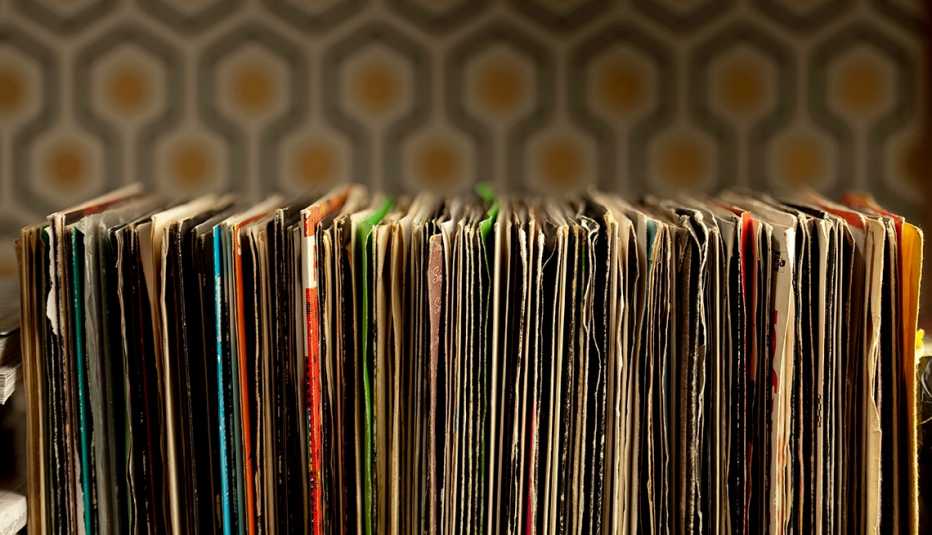 detail of a shelf of vinyl records in sleeves