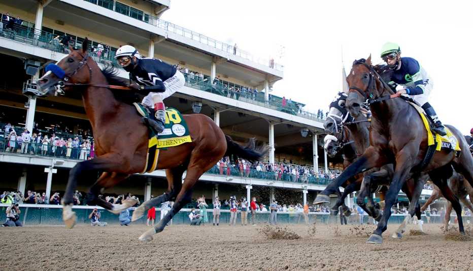 Horses racing on the track during the 146th running of the Kentucky Derby at Churchill Downs