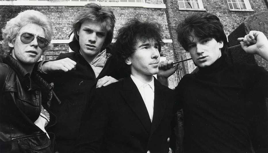 A black and white photo of U2 in 1979
