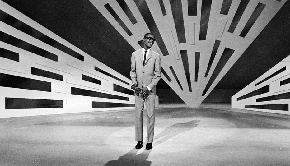 a black and white photo of stevie wonder smiling during rehearsals for the ed sullivan show