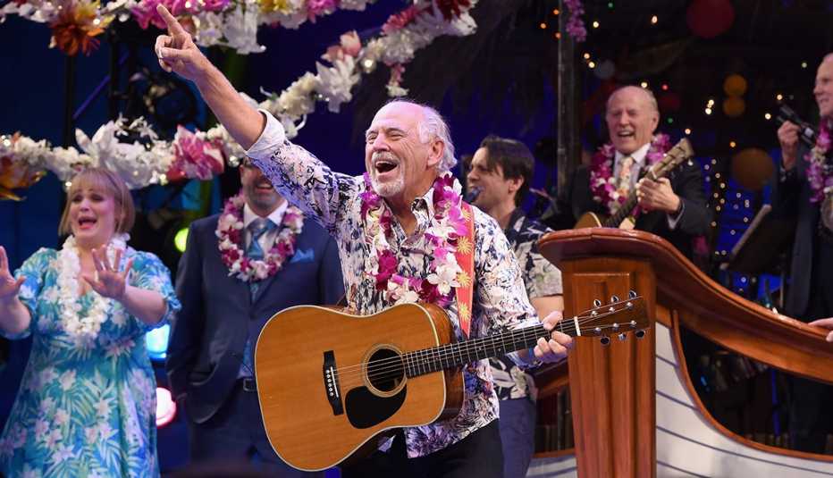 jimmy buffett performs on stage