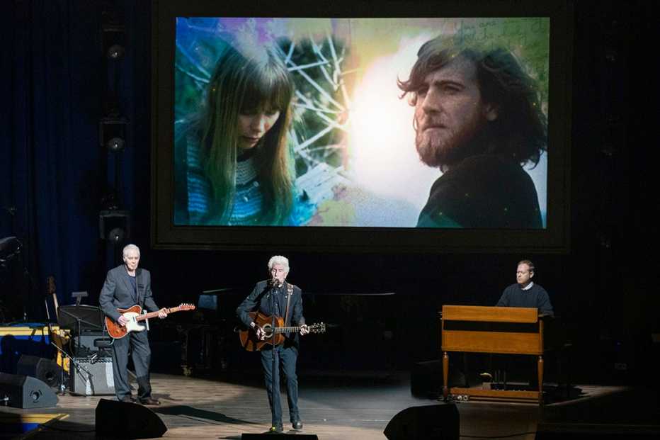 Graham Nash performing onstage during the Library of Congress Gershwin Prize for Popular Song ceremony honoring Joni Mitchell