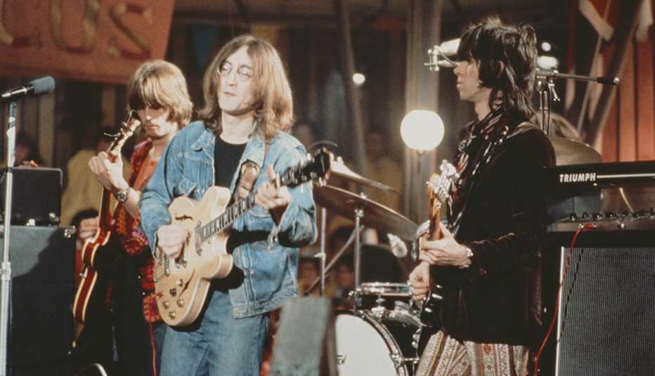 Eric Clapton, John Lennon and Keith Richards perform on the set of The Rolling Stones Rock and Roll Circus in London