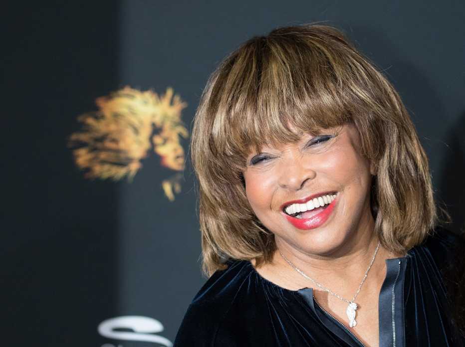 Tina Turner laughing during a photo shoot for Tina - The Tina Turner Musical