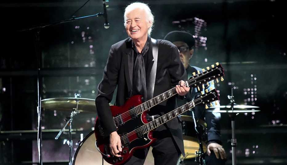 Jimmy Page performs onstage at the 38th Annual Rock & Roll Hall of Fame Induction Ceremony.