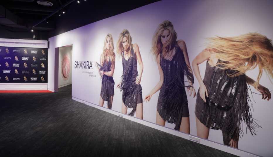Images of Shakira shown on a wall at the Shakira, Shakira: The GRAMMY Museum Experience exhibit