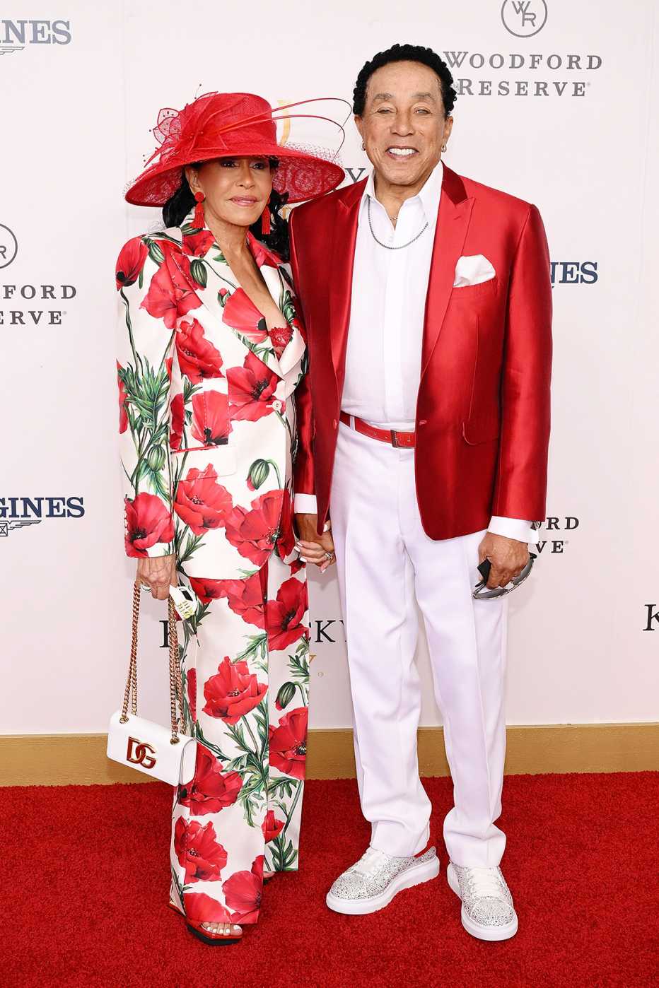 smokey robinson with his wife frances gladney at the kentucky derby in louisville kentucky