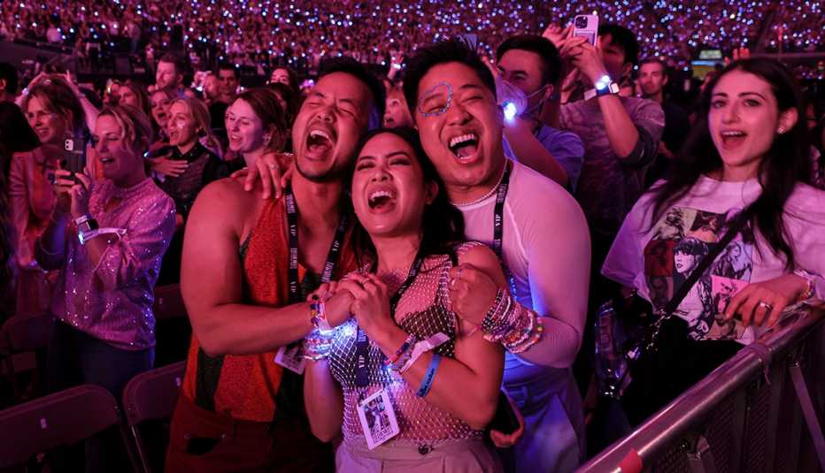 Fans singing along during Taylor Swift's performance at her concert held at Allegiant Stadium in Las Vegas