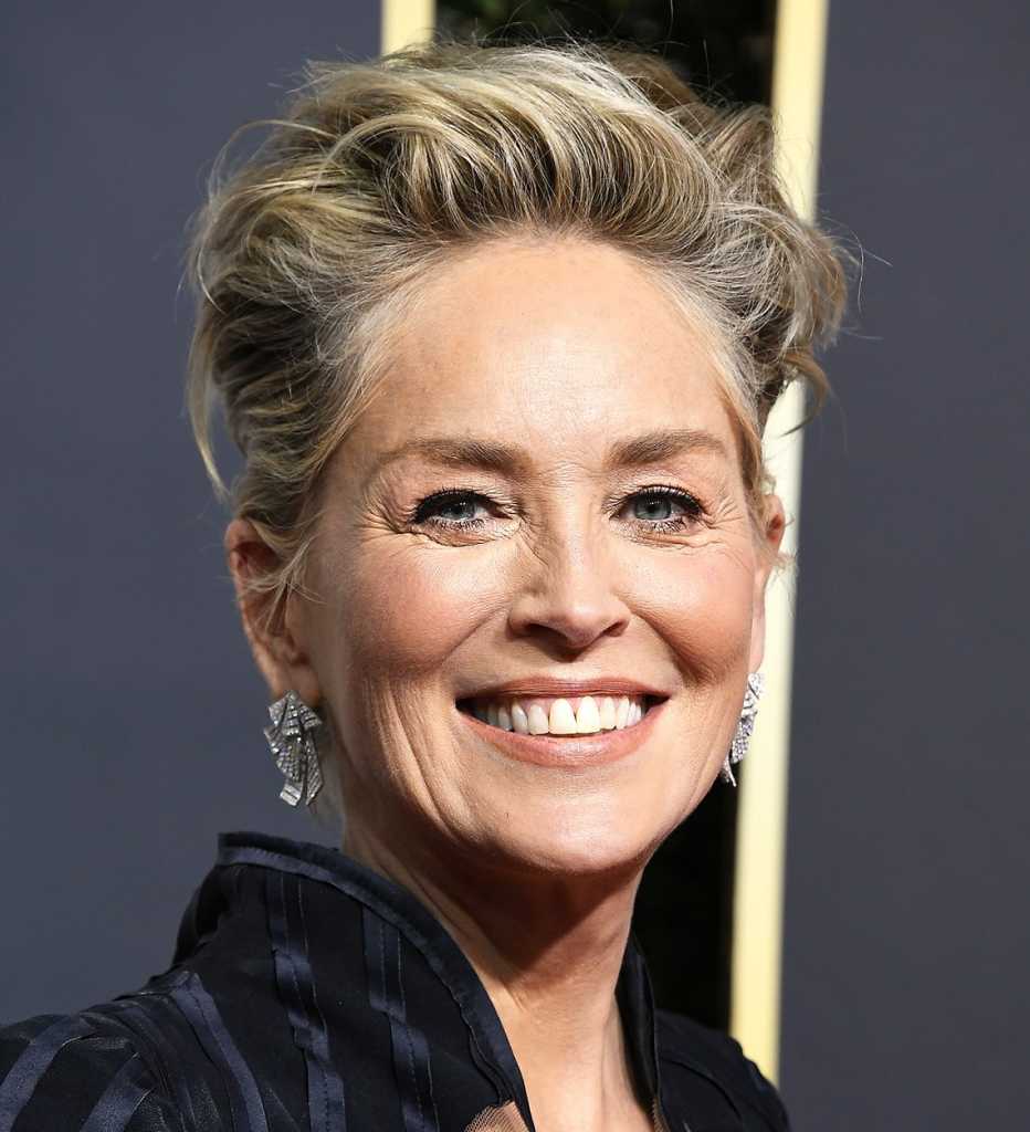 actress sharon stone smiling on the red carpet