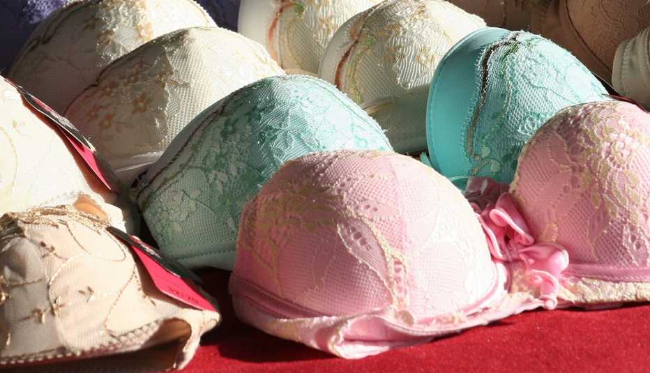 Several styles of bra sitting on a table