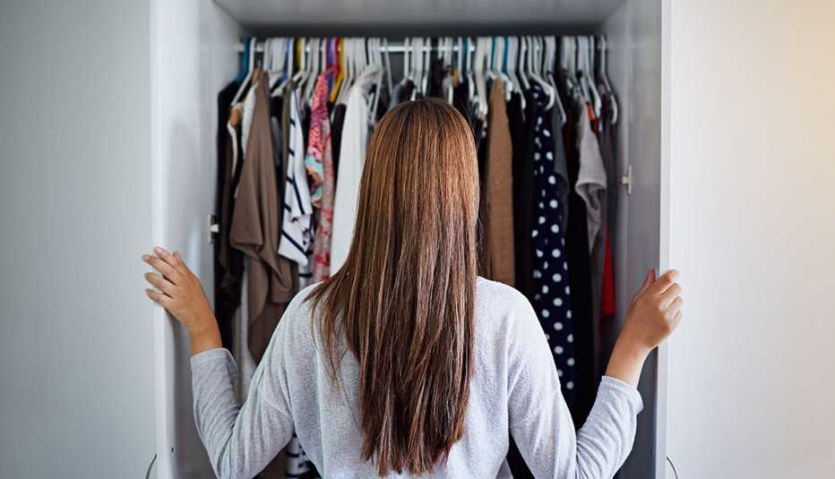 Woman looking at her closet