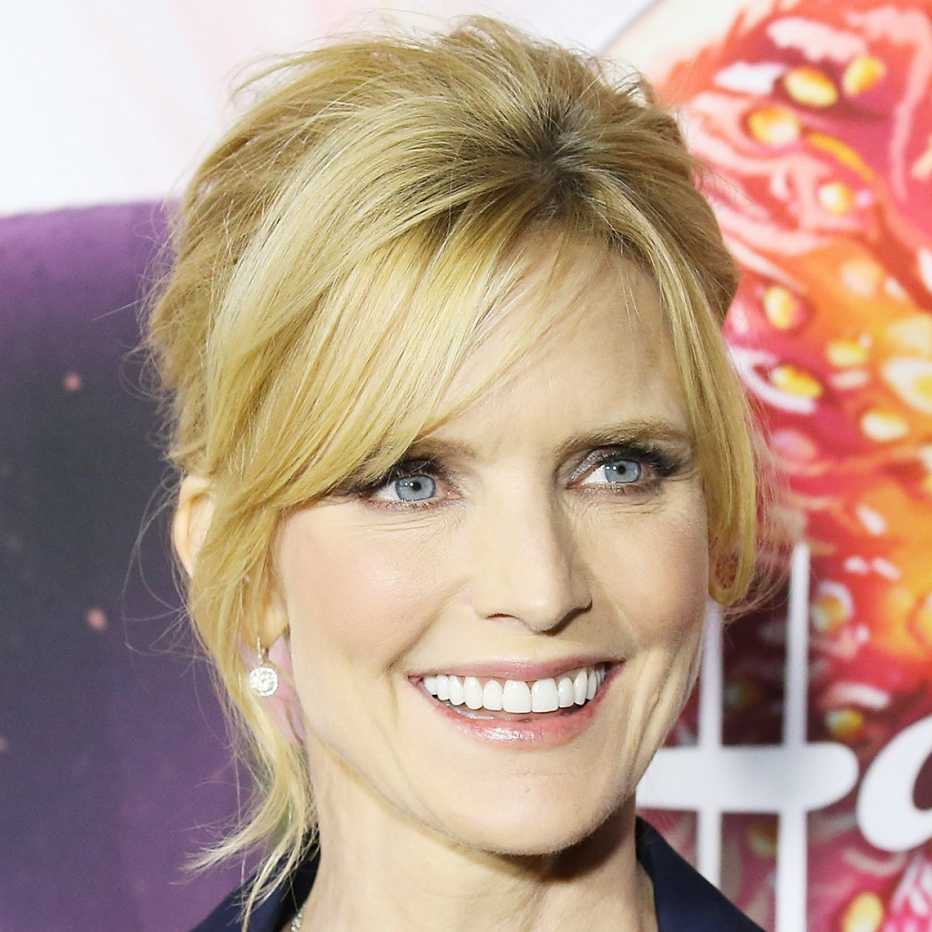 Courtney Thorne-Smith's updo with blonde side swept bangs