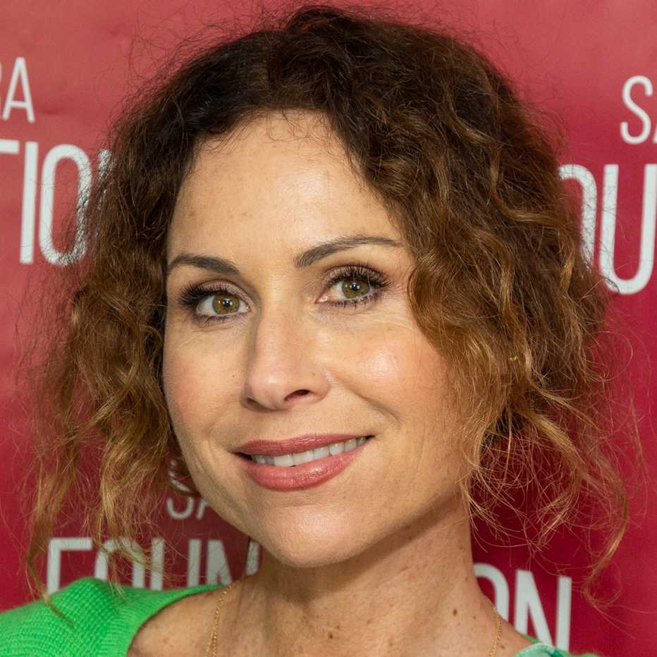 Minnie Driver's wavy highlighted hair looks perfect up or down.