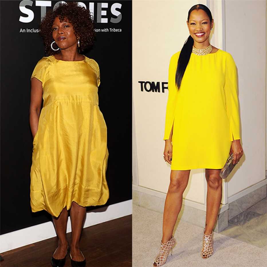 Alfre Woodward and Garcelle Beauvais wearing yellow dresses with sleeves.