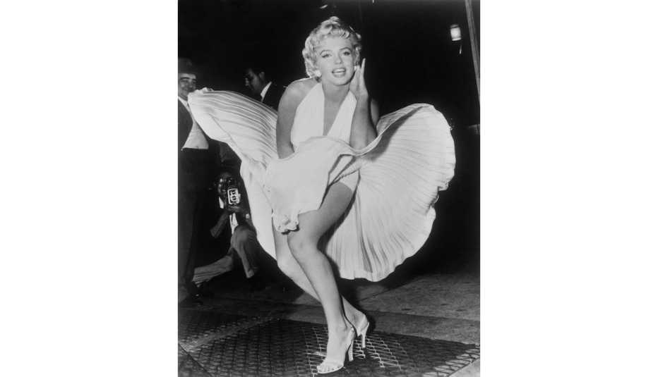 Marilyn Monroe poses over the updraft of a New York subway grating while in character for the filming of "The Seven Year Itch" in Manhattan on September 9, 1954.