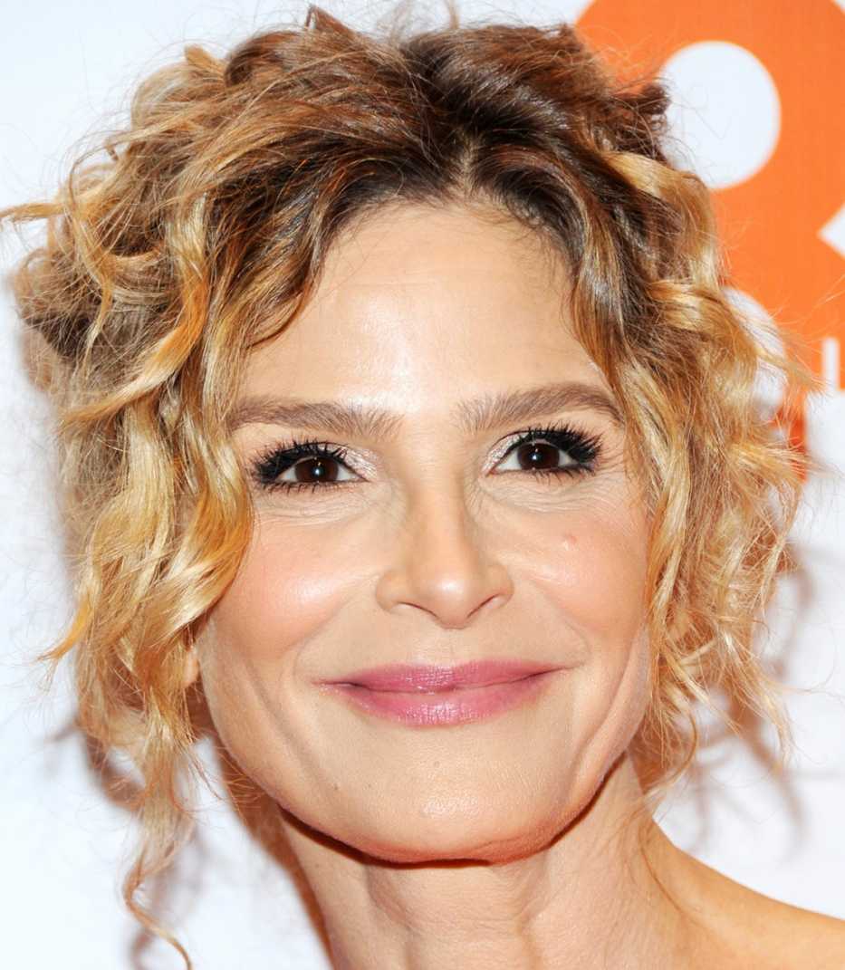 Kyra Sedgwick with brown roots